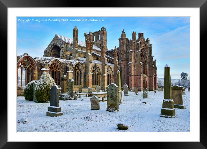 Ruins of Melrose Abbey in snow, Scottish Borders Framed Mounted Print by Angus McComiskey