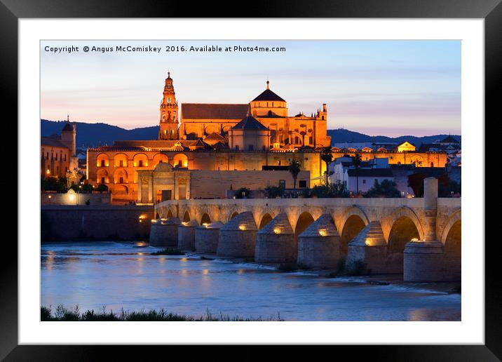 Cathedral Mosque and Roman Bridge at dusk Framed Mounted Print by Angus McComiskey