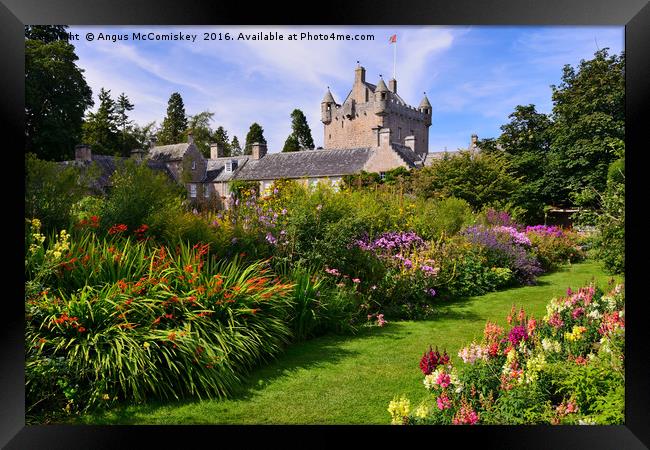 Cawdor Castle and flower garden Framed Print by Angus McComiskey