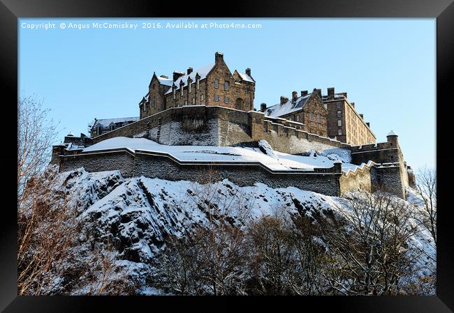 Edinburgh Castle in snow Framed Print by Angus McComiskey