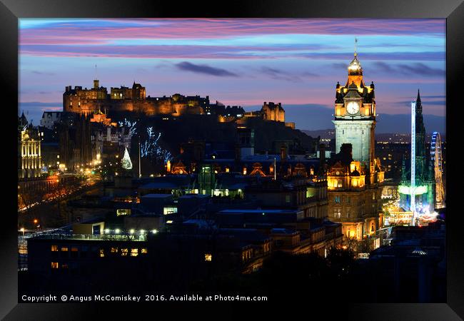 Edinburgh Castle and city skyline at dusk Framed Print by Angus McComiskey
