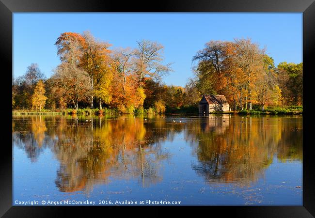 Boathouse on Penicuik Pond in autumn Framed Print by Angus McComiskey