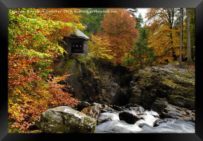Ossian’s Hall and Black Linn Waterfall in autumn Framed Print by Angus McComiskey