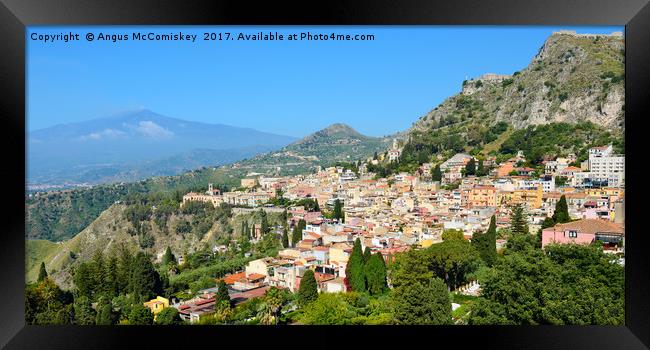 Taormina, Sicily with Mount Etna in background Framed Print by Angus McComiskey