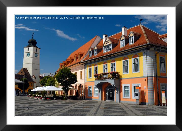 Colourful renovated merchants houses in Sibiu Framed Mounted Print by Angus McComiskey