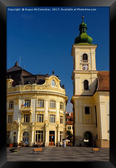 Bell tower of RC Church in Sibiu Framed Print by Angus McComiskey