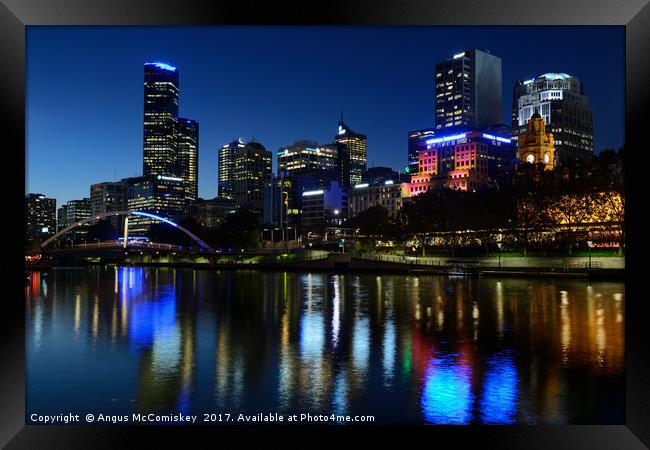 Melbourne Northbank skyline at dusk Framed Print by Angus McComiskey