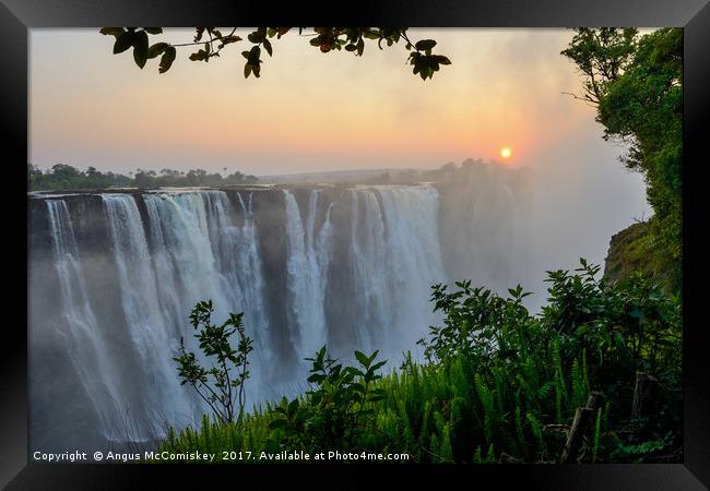 "The smoke that thunders" - Victoria Falls sunrise Framed Print by Angus McComiskey
