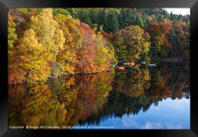 Colourful boats on Loch Faskally Framed Print by Angus McComiskey