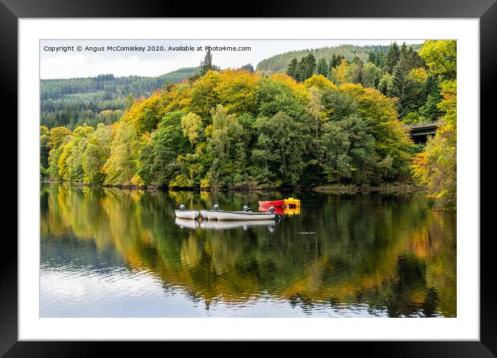 Boats moored on Loch Faskally Framed Mounted Print by Angus McComiskey