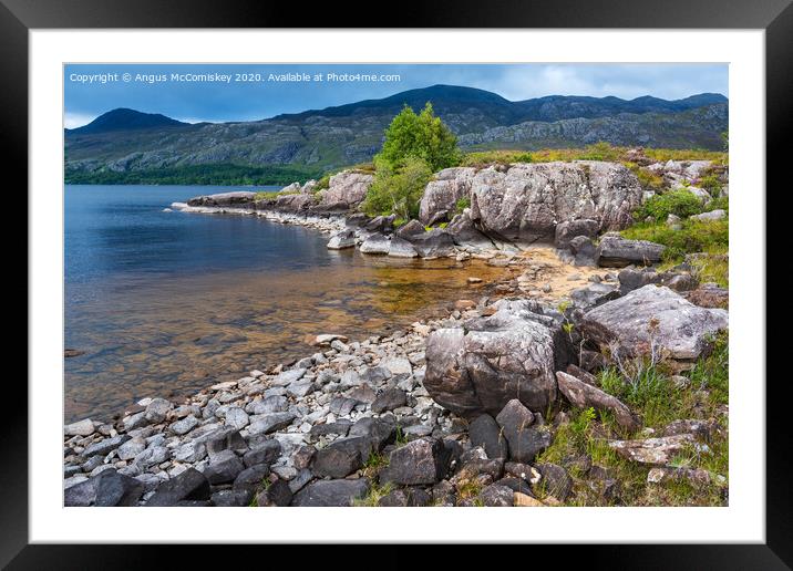 Rocky shoreline of Loch Maree Framed Mounted Print by Angus McComiskey