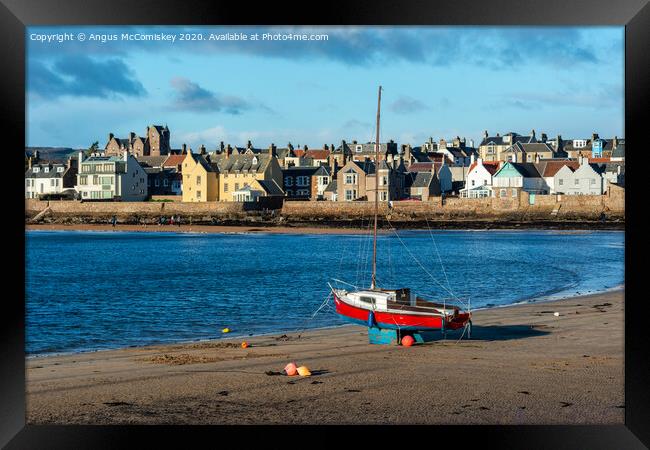 Waiting for the incoming tide Framed Print by Angus McComiskey