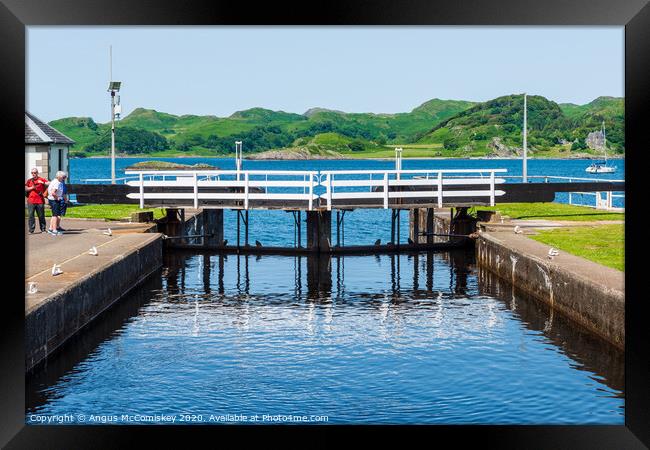 Sea lock on Crinan Canal, Scotland Framed Print by Angus McComiskey