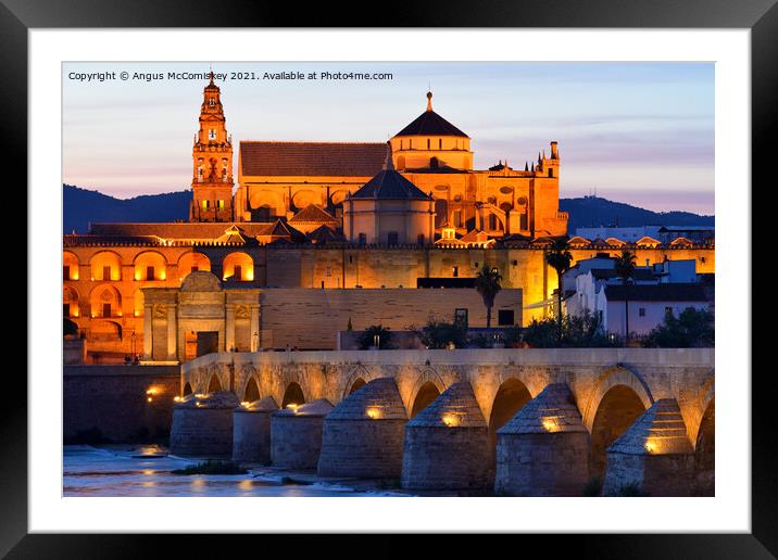 Cordoba Cathedral Mosque and Roman Bridge at dusk Framed Mounted Print by Angus McComiskey