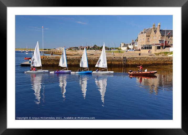 Dinghies returning to Findhorn harbour, Scotland Framed Mounted Print by Angus McComiskey