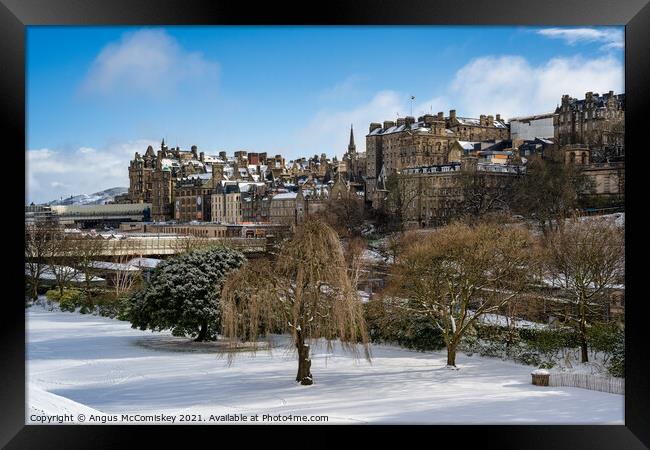 Edinburgh Old Town in snow Framed Print by Angus McComiskey
