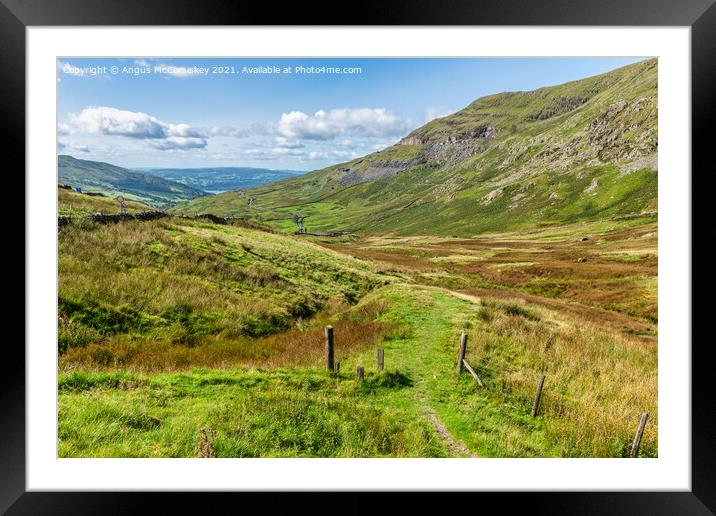 Kirkstone Pass footpath Framed Mounted Print by Angus McComiskey