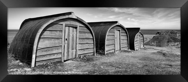 Upturned Boat Sheds on Holy Isle, Northumberland Framed Print by Alan Crawford