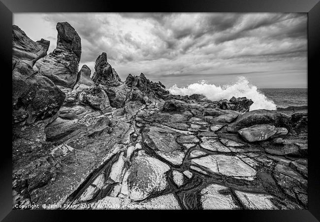 Dramatic lava rock formation called the Dragon's T Framed Print by Jamie Pham