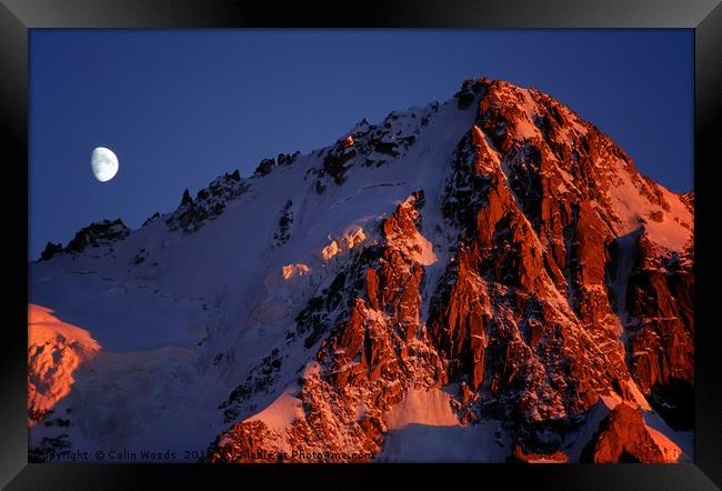 Moonrise and sunset on the Aiguille de Chardonnet Framed Print by Colin Woods