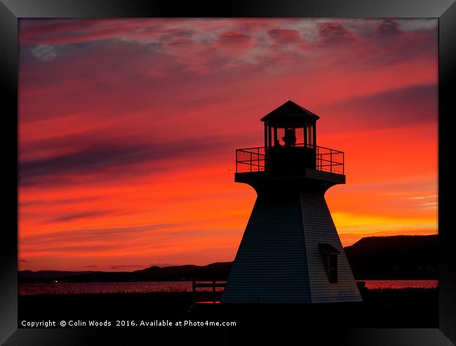 Lighthouse at Sunset Framed Print by Colin Woods