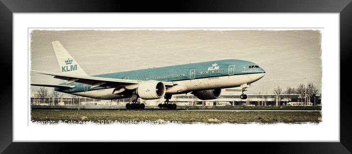 A KLM Boeing 777 landing at Schiphol airport , Ams Framed Mounted Print by Colin Woods