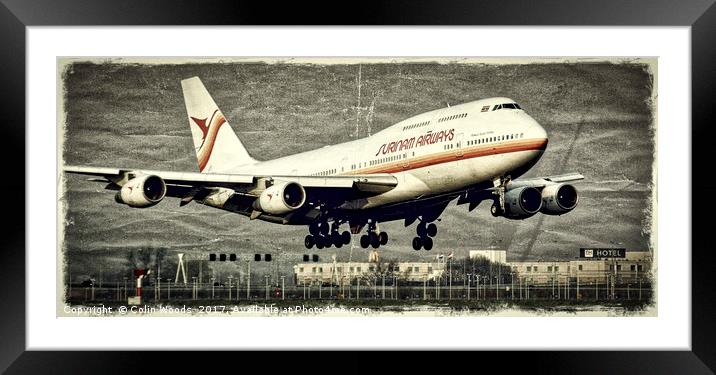 A Surinam Airways Boeing 747 landing at Schiphol a Framed Mounted Print by Colin Woods