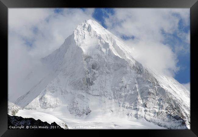 The mighty Dent Blanche in the Valais area of the  Framed Print by Colin Woods