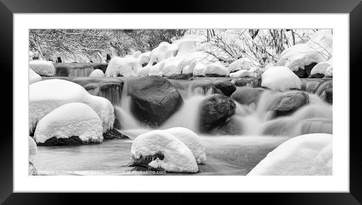 Fresh snow by a river in Quebec, Canada Framed Mounted Print by Colin Woods