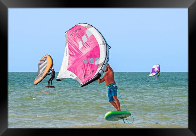 Wing Surfers at Sea Framed Print by Arterra 
