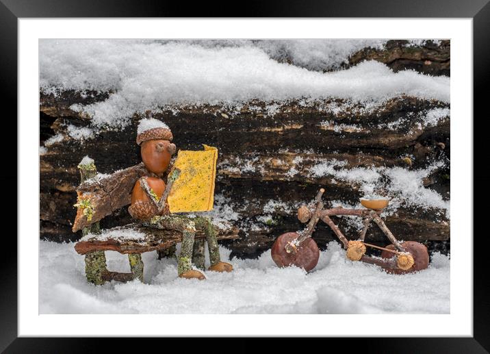 Little Acorn Man Reading Newspaper in the Snow Framed Mounted Print by Arterra 