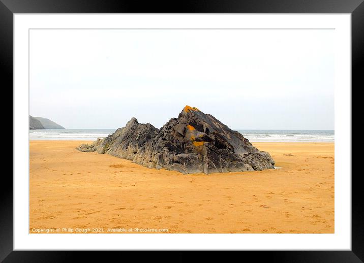 A rock standing on a southern beach in England. Framed Mounted Print by Philip Gough