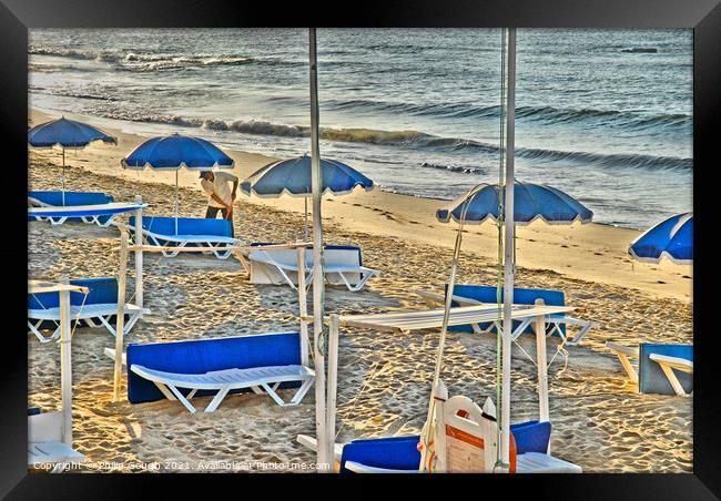 Deckchairs On Beach in Portugal Framed Print by Philip Gough