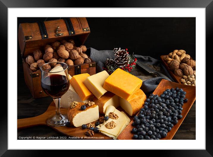 Variety of cheese on a wooden board Framed Mounted Print by Ragnar Lothbrok