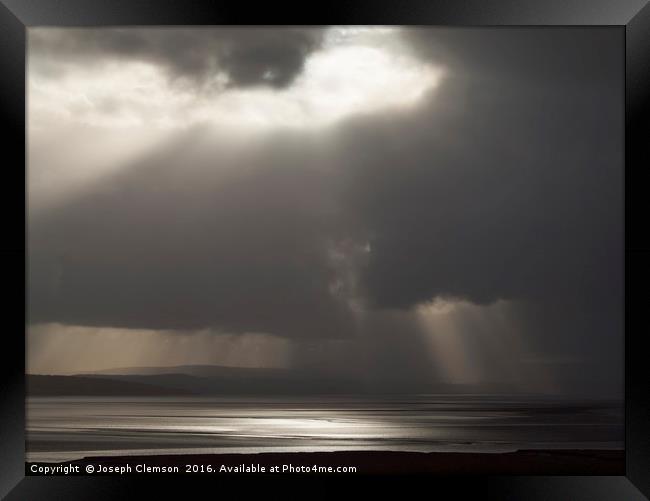 Dramatic storm cloud over Arnside Framed Print by Joseph Clemson