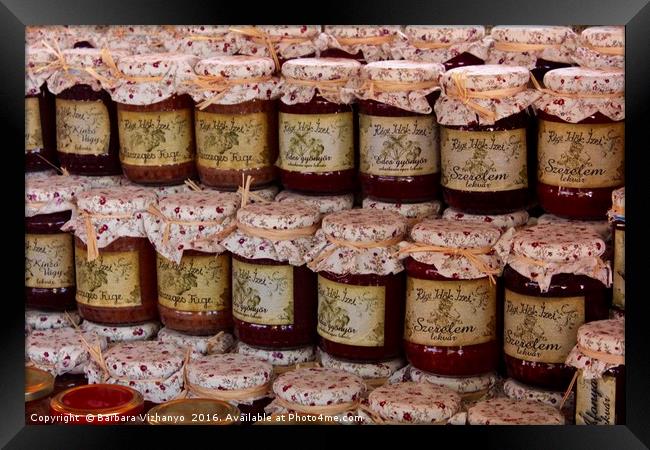 Jam pots lined up on a display at Tihany, Hungary Framed Print by Barbara Vizhanyo