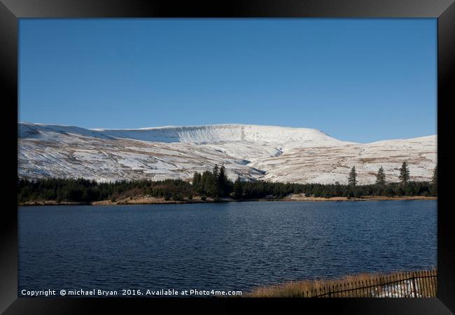 Snow covered mountains In Brecon, Wales Framed Print by michael Bryan