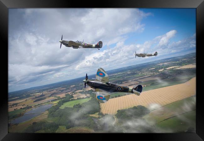 Spitfires on patrol Framed Print by George Cairns