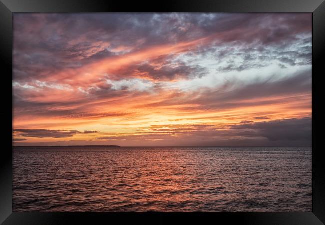 Sunset Over Leysdown on sea Framed Print by Wayne Lytton