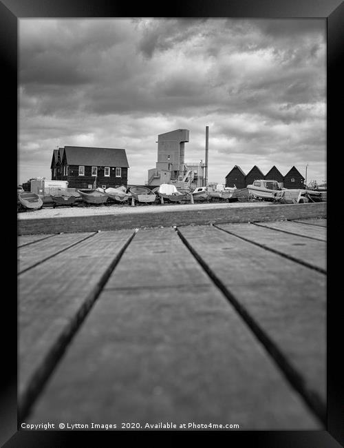 Whitstable Fishing Huts (black and white) Framed Print by Wayne Lytton