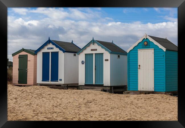 A Colourful Array of Beach Huts Framed Print by Kevin Snelling