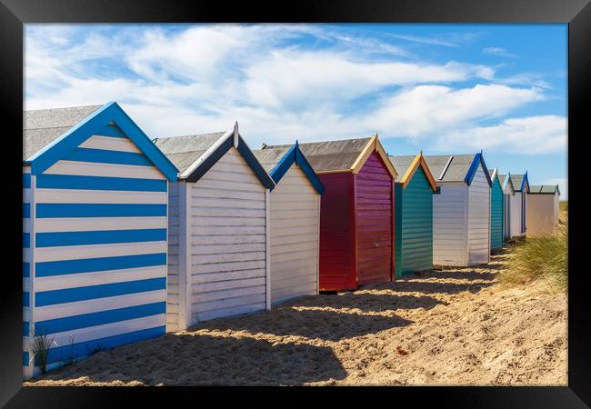 Bright and Vibrant Seaside Cabins Framed Print by Kevin Snelling