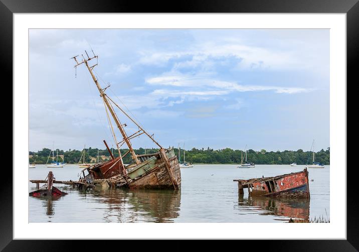 Decaying Fleet Surrenders to Tides Framed Mounted Print by Kevin Snelling