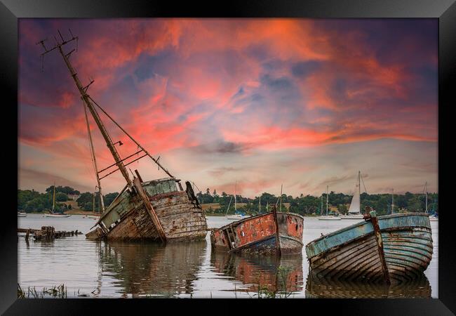 Nostalgic Sunset on Abandoned Boats Framed Print by Kevin Snelling