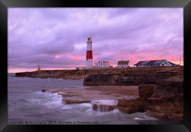 Portland Bill lighthouse at sunset Framed Print by Chris Harris