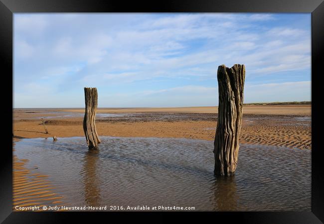 Wooden Posts, Titchwell beach Framed Print by Judy Newstead-Howard