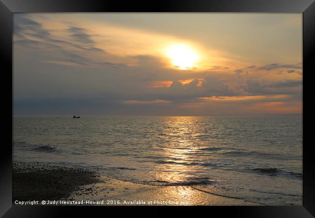 Boat on the sea, Holme, Norfolk Framed Print by Judy Newstead-Howard