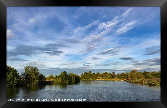 Tranquil Norfolk sky Framed Print by Tom Dolezal