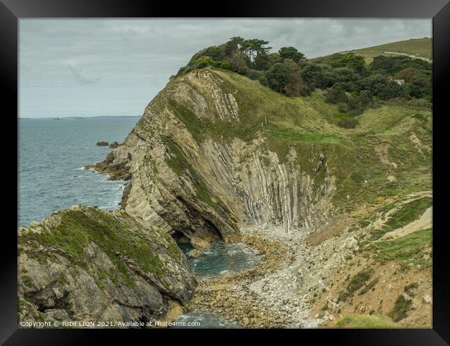 Rock formations at Lulworth Cove Framed Print by JUDI LION