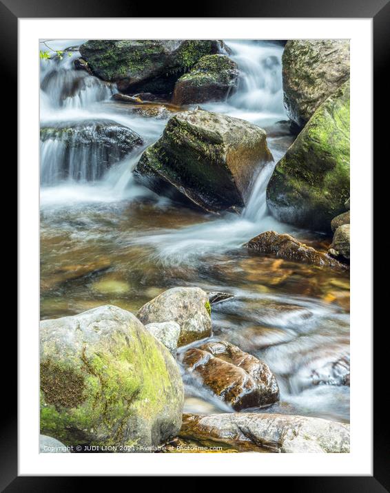 Water over the rocks Framed Mounted Print by JUDI LION